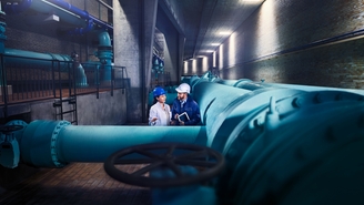 Engineers in front of a water distribution network